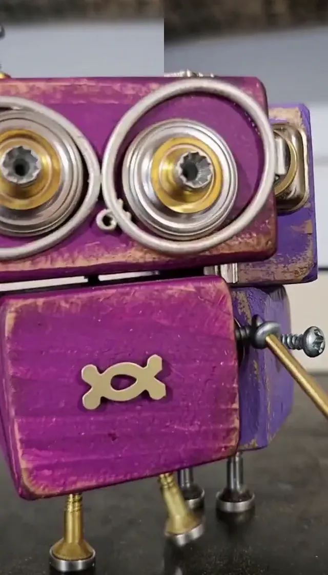 Smalltown Boy characters — two scrap-wood robots